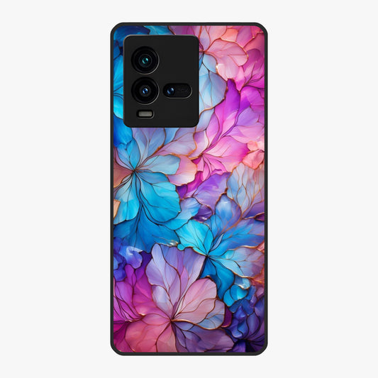 Radiant Floral Whirl Glass Case showing flat back view with swirling floral artwork and glossy glass finish.