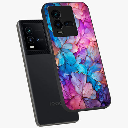 Radiant Floral Whirl Glass Case displayed in angled mockup highlighting vibrant flower pattern with dynamic artistic aesthetic.
