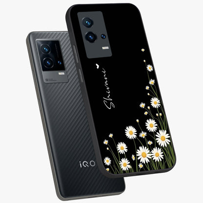 Daisy Cascade Custom Name Glass Case displayed in angled mockup highlighting delicate daisy artwork with custom name feature.