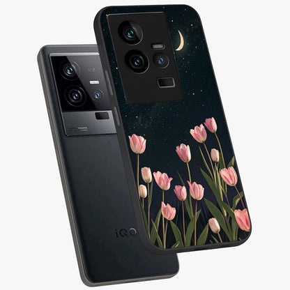 Midnight Tulip Whispers Vibe Glass Case displayed in angled mockup highlighting delicate tulip design with midnight floral aesthetic.