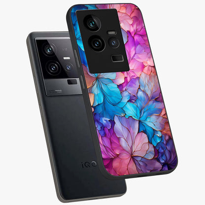 Radiant Floral Whirl Glass Case displayed in angled mockup highlighting vibrant flower pattern with dynamic artistic aesthetic.