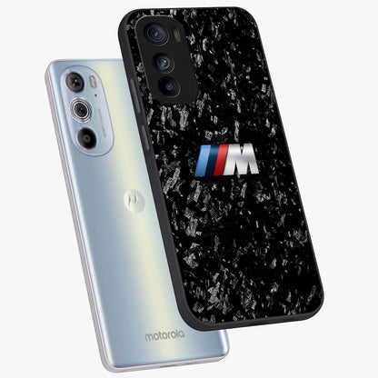 Carbon Speed Mark Glass Case displayed in angled mockup highlighting racing inspired carbon design and sleek aesthetic style.
