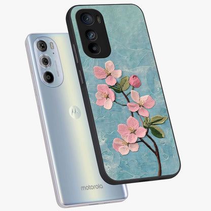 Threaded Blossom Breeze Glass Case displayed in angled mockup highlighting elegant floral design with soft aesthetic style.