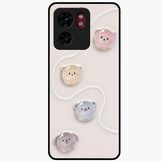 Puffy Face Parade Glass Case showing flat back view with cute puffy character faces artwork and glossy glass finish.