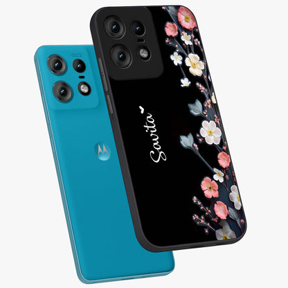 Black Elegance Floral Custom Name Glass Case displayed in angled mockup highlighting dark floral aesthetic and custom name feature.