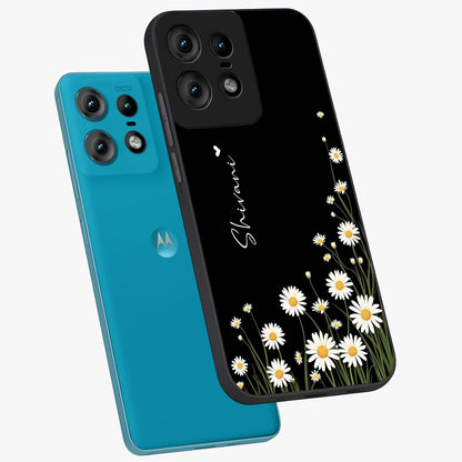 Daisy Cascade Custom Name Glass Case displayed in angled mockup highlighting delicate daisy artwork with custom name feature.