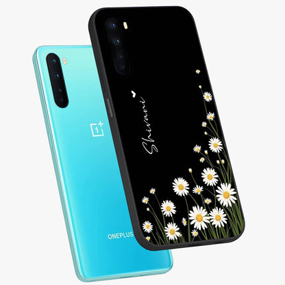 Daisy Cascade Custom Name Glass Case displayed in angled mockup highlighting delicate daisy artwork with custom name feature.