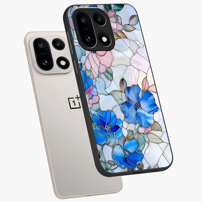 Stained Blue Floral Glass Case for 1+15 angled mockup showcasing glossy glass finish and rich sapphire tones
