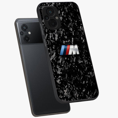 Carbon Speed Mark Glass Case displayed in angled mockup highlighting racing inspired carbon design and sleek aesthetic style.