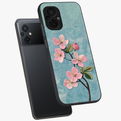 Threaded Blossom Breeze Glass Case displayed in angled mockup highlighting elegant floral design with soft aesthetic style.