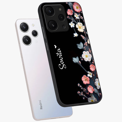 Black Elegance Floral Custom Name Glass Case displayed in angled mockup highlighting dark floral aesthetic and custom name feature.
