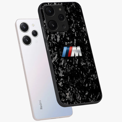 Carbon Speed Mark Glass Case displayed in angled mockup highlighting racing inspired carbon design and sleek aesthetic style.