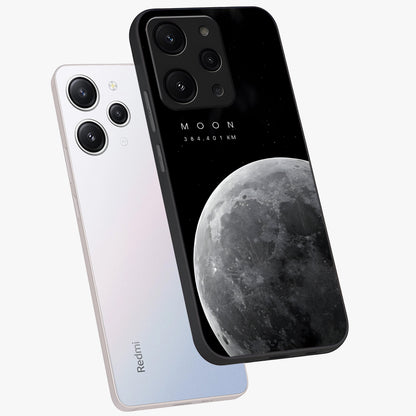 Cosmic Moon Glow Glass Case displayed in angled mockup highlighting celestial moon design with cosmic aesthetic theme.