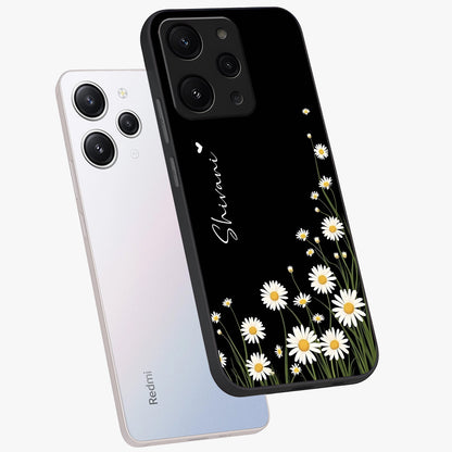 Daisy Cascade Custom Name Glass Case displayed in angled mockup highlighting delicate daisy artwork with custom name feature.