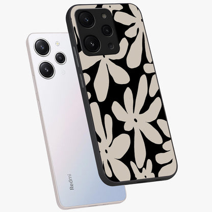 Monochrome Petal Dance Glass Case displayed in angled mockup highlighting elegant petal design with black and white aesthetic.