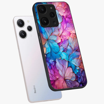 Radiant Floral Whirl Glass Case displayed in angled mockup highlighting vibrant flower pattern with dynamic artistic aesthetic.