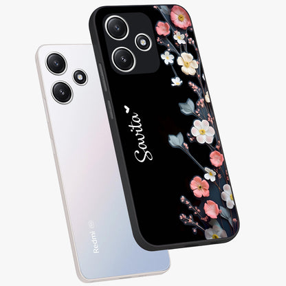 Black Elegance Floral Custom Name Glass Case displayed in angled mockup highlighting dark floral aesthetic and custom name feature.