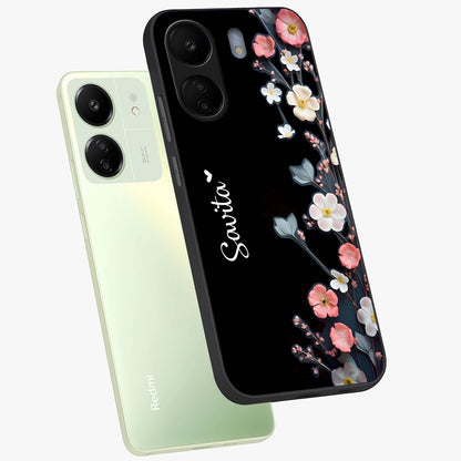Black Elegance Floral Custom Name Glass Case displayed in angled mockup highlighting dark floral aesthetic and custom name feature.