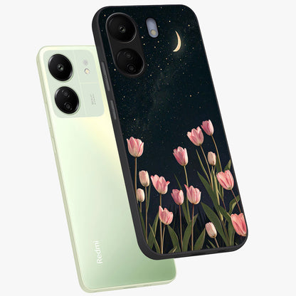 Midnight Tulip Whispers Vibe Glass Case displayed in angled mockup highlighting delicate tulip design with midnight floral aesthetic.
