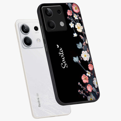 Black Elegance Floral Custom Name Glass Case displayed in angled mockup highlighting dark floral aesthetic and custom name feature.