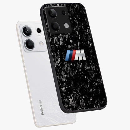 Carbon Speed Mark Glass Case displayed in angled mockup highlighting racing inspired carbon design and sleek aesthetic style.