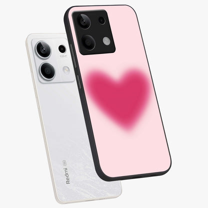 Pink Aura Heart Glass Case displayed in angled mockup highlighting vibrant pink heart design with dreamy aura aesthetic.