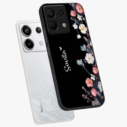 Black Elegance Floral Custom Name Glass Case displayed in angled mockup highlighting dark floral aesthetic and custom name feature.
