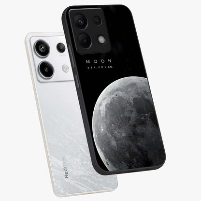 Cosmic Moon Glow Glass Case displayed in angled mockup highlighting celestial moon design with cosmic aesthetic theme.