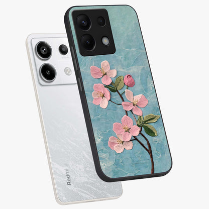 Threaded Blossom Breeze Glass Case displayed in angled mockup highlighting elegant floral design with soft aesthetic style.