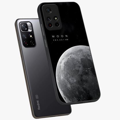 Cosmic Moon Glow Glass Case displayed in angled mockup highlighting celestial moon design with cosmic aesthetic theme.