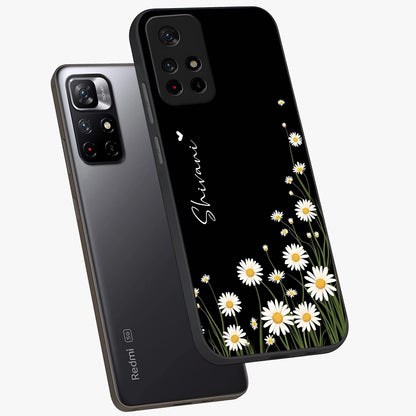 Daisy Cascade Custom Name Glass Case displayed in angled mockup highlighting delicate daisy artwork with custom name feature.