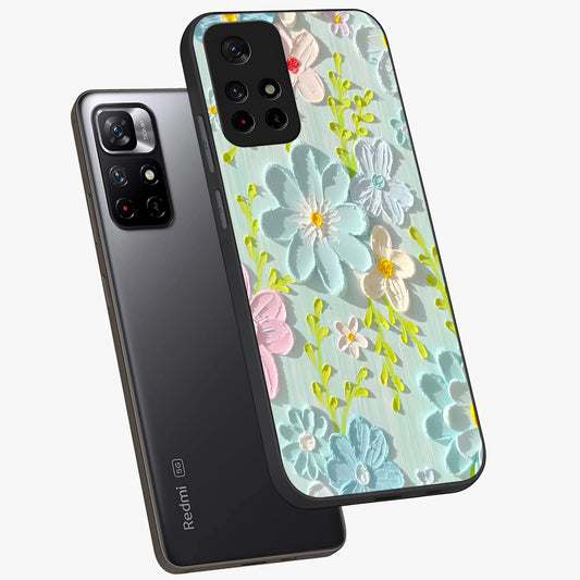 Frosted Petal Garden Glass Case showing flat back view with soft frosted floral artwork and glossy glass finish.