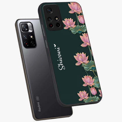 Lotus Bloom Serenity Custom Name Glass Case displayed in angled mockup highlighting graceful lotus illustration with custom name feature.