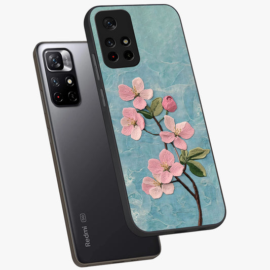 Threaded Blossom Breeze Glass Case showing flat back view with delicate blossom artwork and glossy glass finish.
