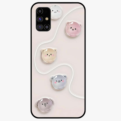 Puffy Face Parade Glass Case showing flat back view with cute puffy character faces artwork and glossy glass finish.