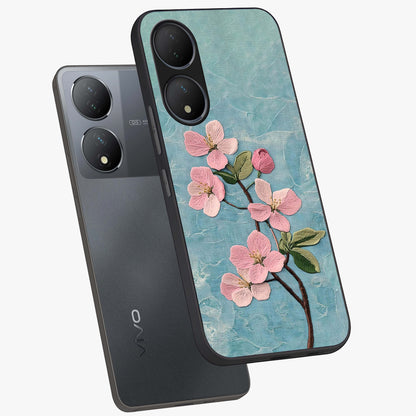 Threaded Blossom Breeze Glass Case displayed in angled mockup highlighting elegant floral design with soft aesthetic style.