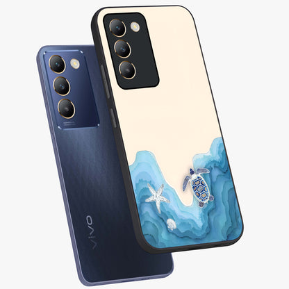 Ocean Drift Turtle Glass Case displayed in angled mockup highlighting peaceful ocean turtle illustration with marine aesthetic.